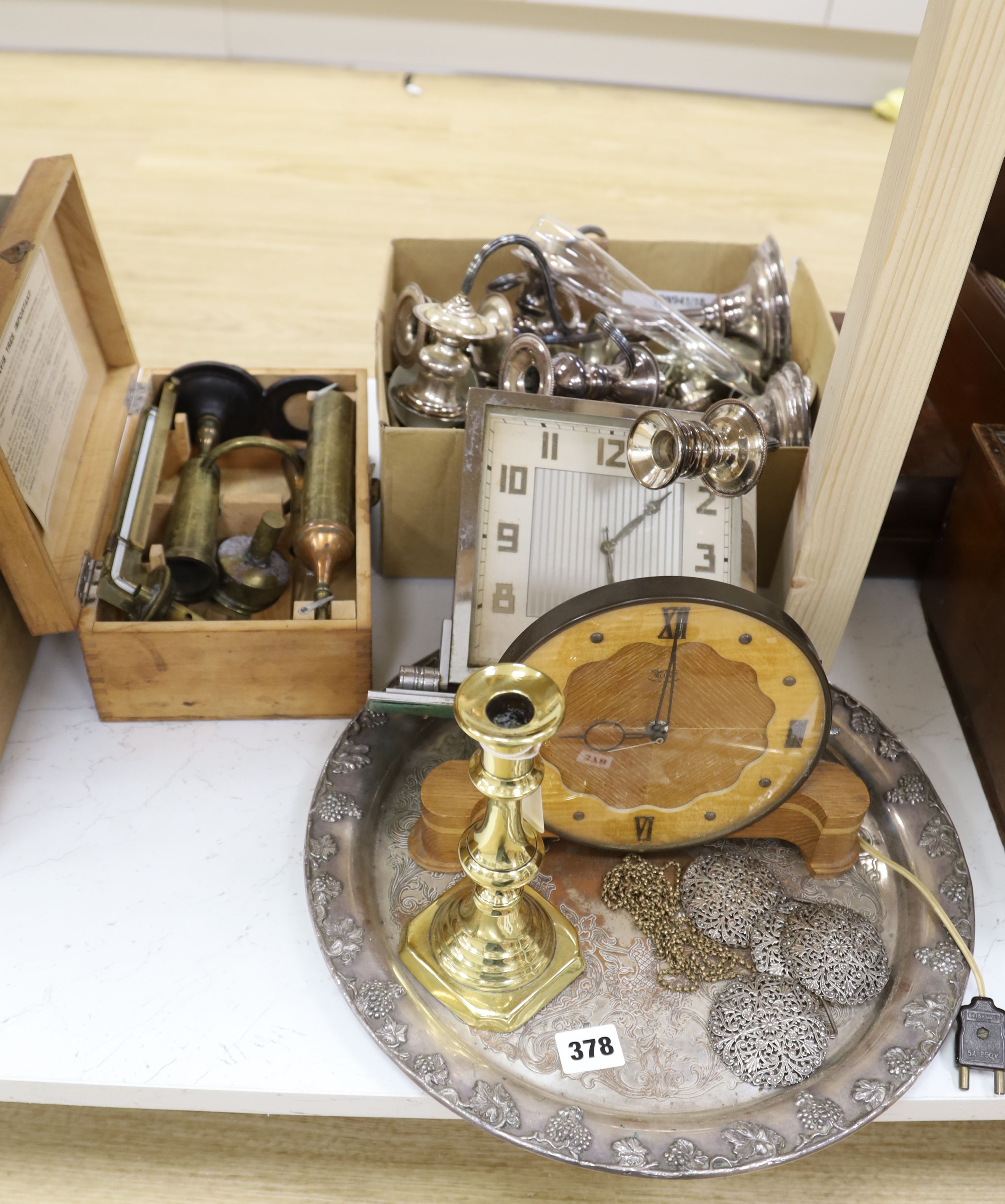 A quantity of silver plated cutlery pair of two branch three light candelabra and tray, Art Deco chrome clock, similar wooden clock, Fr